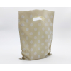 Shopper in plastica HDPE tortora con fantasia PoisBianchi, maniglia fustellata a fagiolo, confezione da 5 kg.