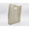 Shopper in plastica HDPE tortora con fantasia PoisBianchi, maniglia fustellata a fagiolo, confezione da 5 kg.