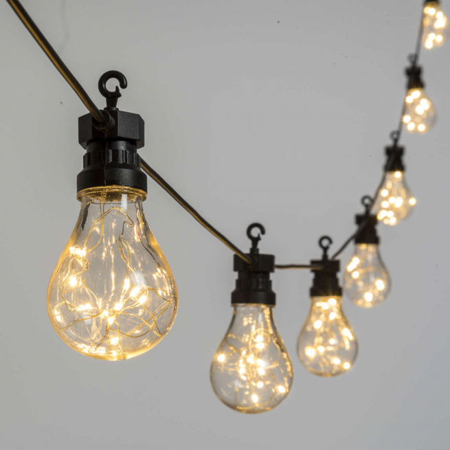 Filo 10 lampadine in plastica "Goccia" A67 trasparente da 100 microled bianco caldo, filo nero, per uso interno ed esterno, lunghezza metri 5