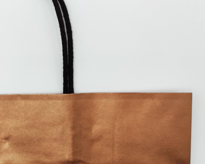 Shopper perlato rame con maniglia ritorta ricoperta in cotone