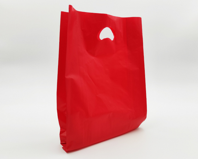 Shopper in plastica HDPE rossa, con maniglia fustellata a fagiolo