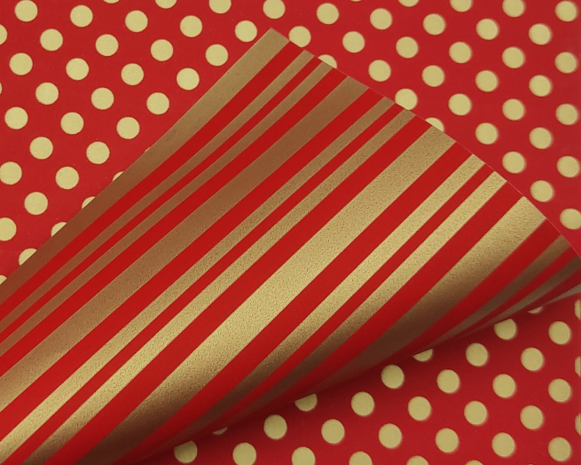 Carta da regalo double rosso 1 lato pois oro e 1 lato righe oro, formato 70x100 cm, confezione da 25 fogli