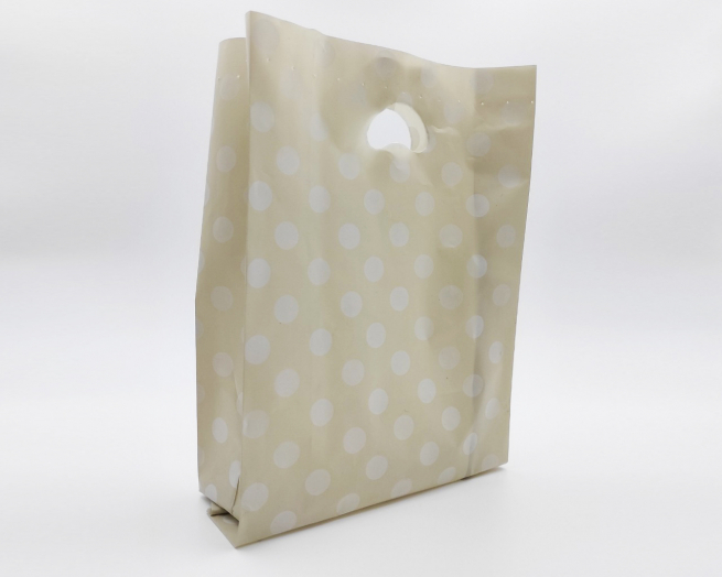 Shopper in plastica HDPE tortora con fantasia "Pois"Bianchi, maniglia fustellata a fagiolo, confezione da 5 kg.