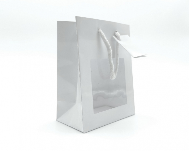 Shopper bianco in carta plastificata opaca, con finestra, maniglia in cotone e tag