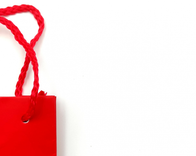 Shopper rosso in carta plastificata opaca, maniglia in cotone