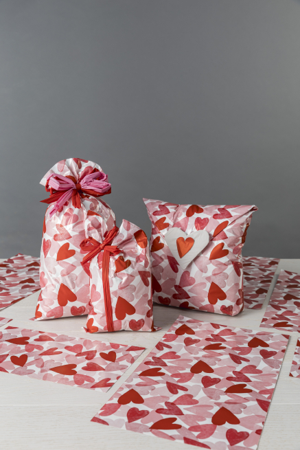Sacchetto regalo perlato fantasia "Batticuore" rosso fondo bianco, vari formati