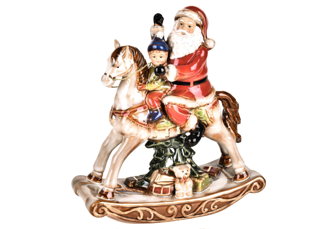 Babbo Natale e bimbo su cavallo a dondolo in porcellana, altezza 25 cm