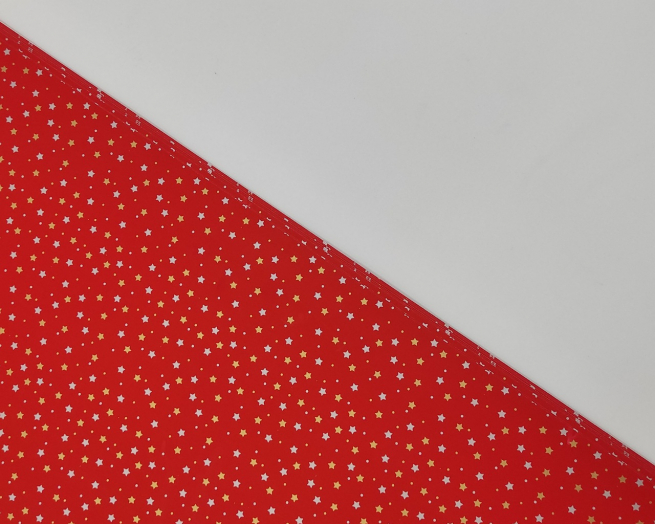 Carta da regalo tinta unita rosso con stelline, formato 70x100 cm, confezione da 25 fogli