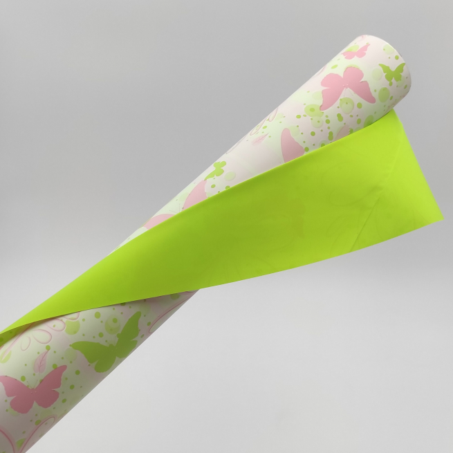 Bobina in PPL "Ninfa", stampa fiori e farfalle su base rosa e verde, h 1 x 25 mt