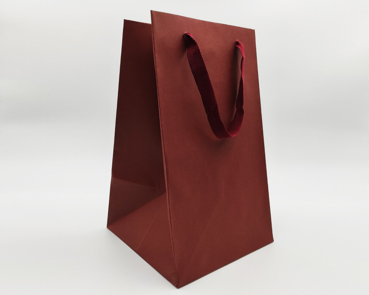 Shopper con maniglia in stoffa